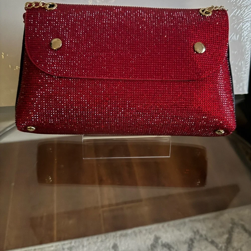 Elegant Red Clutch with Gold Chain
